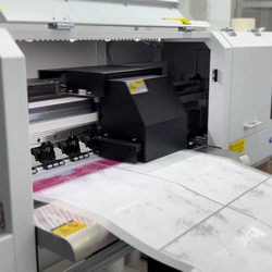 производство DTF принтов на пленке — печать термотрансферов для текстиля